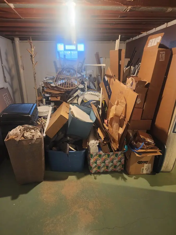 Roll-off dumpster container at job site for 4 Yard Dumpster Rental in University Park